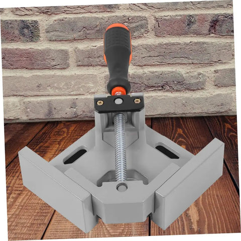 Heavy Duty Right Angle Clamp For Woodworking And Precision Welding With Badass Aluminum Build No Sweat Single Handle Design For Hella Tough 90 Degree Corners Every Time on wooden surface.