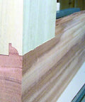 Image showcasing precise mortise and tenon joint cut with Hardcore Three Piece Router Bit Set For Entry AND Interior Doors Featuring Anti Kickback Design AND Nonstick Orange Shield Coating With Tough Carbide Edges For Straight Shooting Woodworking On Router Tables.