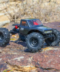 Ascent-18 Apex 1/18 Scale Brushless Rock Crawler With Carbon Fiber Chassis, on rocky terrain