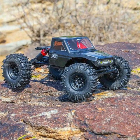 Ascent-18 Apex 1/18 Scale Brushless Rock Crawler With Carbon Fiber Chassis, on rocky terrain
