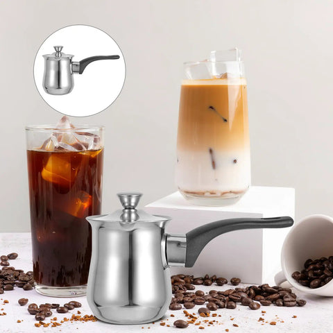 6 Ounce Turkish Coffee Pot With Lid Stainless Steel Saucepan Coffee Maker in front of iced coffee drinks and scattered coffee beans.