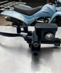 Left Hand Hydraulic Brake Lever Master Cylinder for Mini Bike ATV Quad Dirt Bikes, displayed on a metal surface