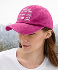 Woman wearing Funny Spare Time RV Camper Hat For Women In Distressed Washed Pomegranate Red outdoors