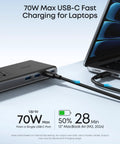 Close-up of Top Tier Desk Organizer Power Strip Featuring Space Saving Clamp Design 70W Usb C Rapid Charge charging a laptop.
