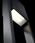 Close-up view of Archetype 18 Inch LED Wall Light for indoor outdoor use, black aluminum housing with up and down lighting.