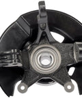 Front Right Wheel Bearing And Hub Assembly With Loaded Knuckle For 2005 To 2008 Honda Pilot view from above showing black metal housing and bearing.
