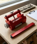 Shop Ready Fixed Angle Sharpening Jig With Built Tough Rigid Metal Frame And Knurled Tightening Knob For Precision Edge Honing On Professional Woodworking Hand Tools on a wooden workbench.