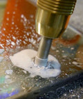 Close-up of Go-To 10 Pack Diamond Drill Bit Set 6mm (1/4 Inch) Small Diamond Hole Saw Kit in use on glass surface