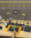 Heavy-Duty Soldering Station With Magnetic Third-Hand Rig, Non-Slip Silicone Pad, Steel Base, multiple accessories on table.