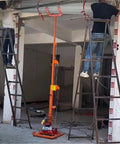 Heavy Duty Small Lifting Platform for Roller Shutter Door Maintenance and Workshop Ventilation Pipe Installations shown in use