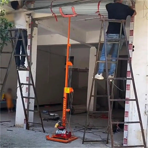 Two workers using a Top Shelf Industrial Winch Crane And Overhead Hoist System for lifting tasks in a garage.