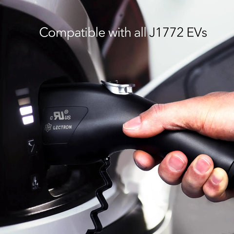 Hand using Level 1 And Level 2 Portable EV Charger With Dual Plugs NEMA 5-15 And NEMA 14-50, 240V 40 Amp Input on J1772 EV, Black.