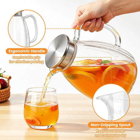 2.2L Glass Pitcher With Lid And Handle, Borosilicate Water Carafe, Stainless Steel Dual Filter Lid pouring iced tea