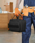 Electrician holding Carrying Case For Klein Tools 80101 ET310 AC Circuit Breaker Finder And Electrical Test Tools in workshop