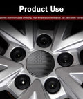 Fresh Dope Matte Black American Flag Wheel Center Cap Stickers 4 Pack 56Mm on a silver alloy wheel with black accents.
