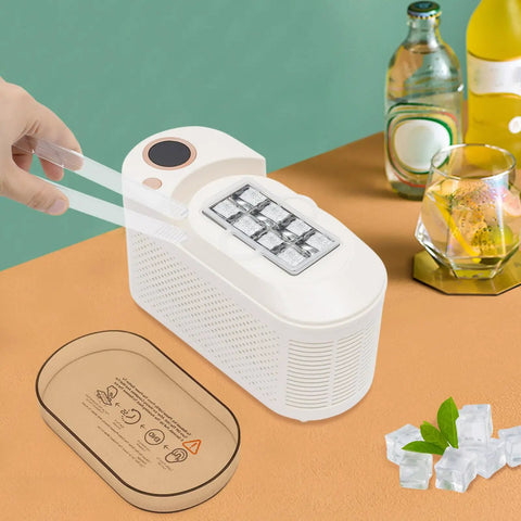 Quick Chill Portable Ice Cube Maker For Home Or Car, white compact design with ice cubes and serving tools on a table.