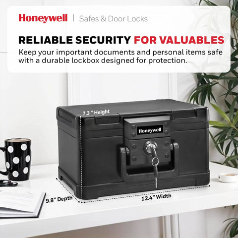 Compact Home Safe Box With Key Lock, Fireproof And Water Resistant, 0.15 Cu Ft, black ABS chest on desk with dimensions displayed.
