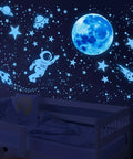 Glow In The Dark Stars Ceiling Set With Moon And Space Wall Decals For Kid Friendly Bedroom Decor Galaxy Planets Sticker Pack Includes 530 Pieces For Nursery And Birthday Party Favors Creating A Real Night Sky Vibe on bedroom wall