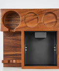 Solid Wood Espresso Tamper Holder Combo With Integrated Knock Box And Grounds Bin Fits Standard 58 Millimeter Portafilters, top view of wooden stand and black bin.