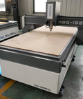 Beefy Heavy Duty Tank Grade CNC Wood Router 1325 4x8 in workshop for engraving, cutting, and milling MDF woodworking projects