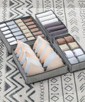 Four Piece Slick Underwear Storage Organizers Featuring Nifty Grid Layouts For Foldable Oxford Fabric Drawer Bins And Wardrobe Packing Boxes Keeping Your Daily Gear Straight Up Neat And Secure, showcasing organized bras and rolls of clothing.