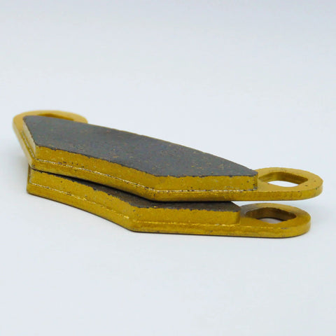 Polaris Sportsman ceramic brake pad set for ATV, front & rear, yellow backing plates with gray friction, side view