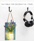 Heavy Duty Rustic Metal Wall Hooks 3 Pack Black Finish 4 Inch Size Mountable Coat Hangers holding decor and headphones
