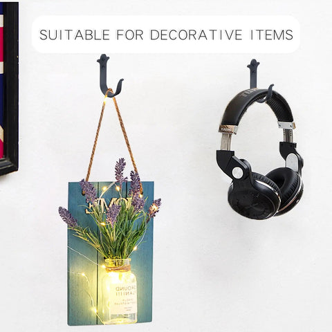 Heavy Duty Rustic Metal Wall Hooks 3 Pack Black Finish 4 Inch Size Mountable Coat Hangers holding decor and headphones