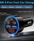 Close-up of the Top Shelf 90 Watt Five Port Usb C Car Charger With Dual Pd 30 W Quick Charge Ports displaying ports and output.