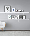 Wall with floating shelves supported by Ten Pack Heavy Duty Shelf Triangle Brackets 12 Inch Long By 8 Inch High Right Angle L Braces.