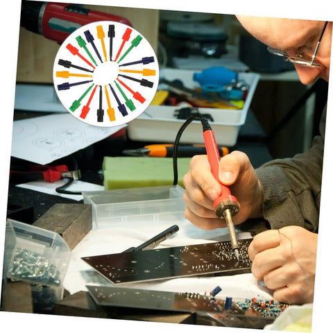 Technician using soldering tool with Alligator Clip Test Probes Set 20 Pack Mini Test Grabbers For Digital Multimeters in background
