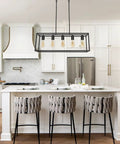 Industrial Black Farmhouse Chandelier Over Table 5 Light Rectangle Hanging Light in modern kitchen setting