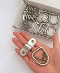 Top Shelf 304 Stainless Steel D Ring Tie Down Anchor Quarter Inch Heavy Duty Truck Haul Gear on hand with screws included.