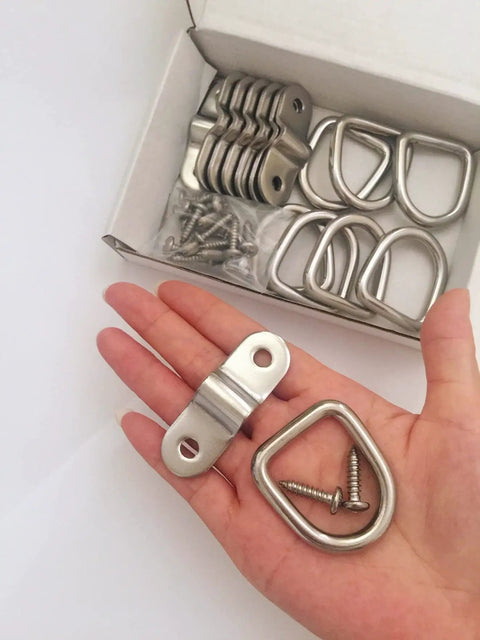 Top Shelf 304 Stainless Steel D Ring Tie Down Anchor Quarter Inch Heavy Duty Truck Haul Gear on hand with screws included.