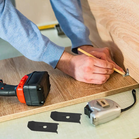Person marking a wood panel using a pencil with Solid As Nails Table Leaf Levelers And Alignment Locks With Sliding Bars And Screws Badass Polished Steel Hardware To Fix Wobbly Tables No Sweat 20 Piece Kit For Slick Upgrades.