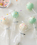 Clear Treat Party Bags 4x9.5 Inches, 150 Pack Great For Gifting, Party Favors, And Treat Wrapping, Food Safe Cellophane Bags with cake pops.