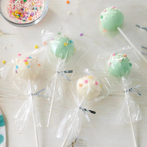 Clear Treat Party Bags 4x9.5 Inches, 150 Pack Great For Gifting, Party Favors, And Treat Wrapping, Food Safe Cellophane Bags with cake pops.