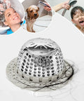 Universal Shower Drain Cover With Slim Hair Catcher And Raised Dome to snag strands and soap chips, light gray, with visible hair caught.