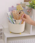 360 Degree Rotating Desk Pen Organizer With Five Slots Multi Purpose Pencil Cup holding pencils and art supplies on desk