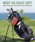 Golf bag with clubs and leather case on course, part of All In One Golf Accessories Kit With Premium Leather Case And Gift Box, Golf Balls, Rangefinder, Tees, Brush, Multifunctional Divot Knife, Scorer, And Ball Clamp For Men And Women