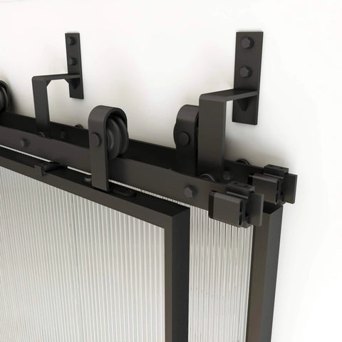 Bypass Glass Barn Door Kit With Double 6-Foot Hardware showing close-up of black carbon steel frame on reeded glass