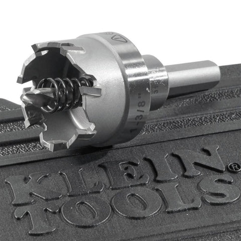 Klein Tools heavy-duty hole saw cutter with pilot bit and spring, close-up view