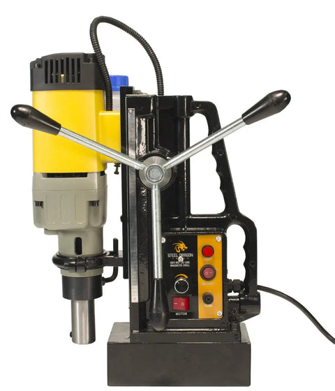 Heavy Duty Magnetic Drill Paired With Seven Piece 2 Inch HSS Annular Cutter Kit For Grit And Grind Metal Fabrication and Tough Job Site Demands Featuring Smooth Rack And Pinion Depth Control Rig, side view.