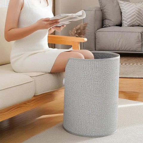 Person using Cozy Under Desk Leg Warmer for Office Use, Portable Foot Warmer and Blanket Heater Under Desk in gray at home