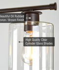 Close-up of Dope Three Light Modern Industrial Farmhouse Kitchen Island Pendant Lighting with clear glass cylinder shade.