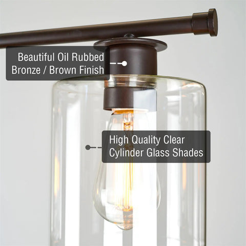 Close-up of Dope Three Light Modern Industrial Farmhouse Kitchen Island Pendant Lighting with clear glass cylinder shade.