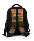 Back view of the Golden Hour Creek Printed Unisex Backpack, showcasing breathable back panel and mountain landscape design.