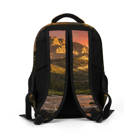 Back view of the Golden Hour Creek Printed Unisex Backpack, showcasing breathable back panel and mountain landscape design.