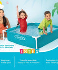 Two children and an adult enjoying a 4 Foot By 12 Inch Mini Durable Vinyl Kiddie Pool For Outdoor Fun, Above Ground Frame, Blue