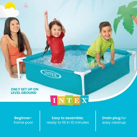 Two children and an adult enjoying a 4 Foot By 12 Inch Mini Durable Vinyl Kiddie Pool For Outdoor Fun, Above Ground Frame, Blue